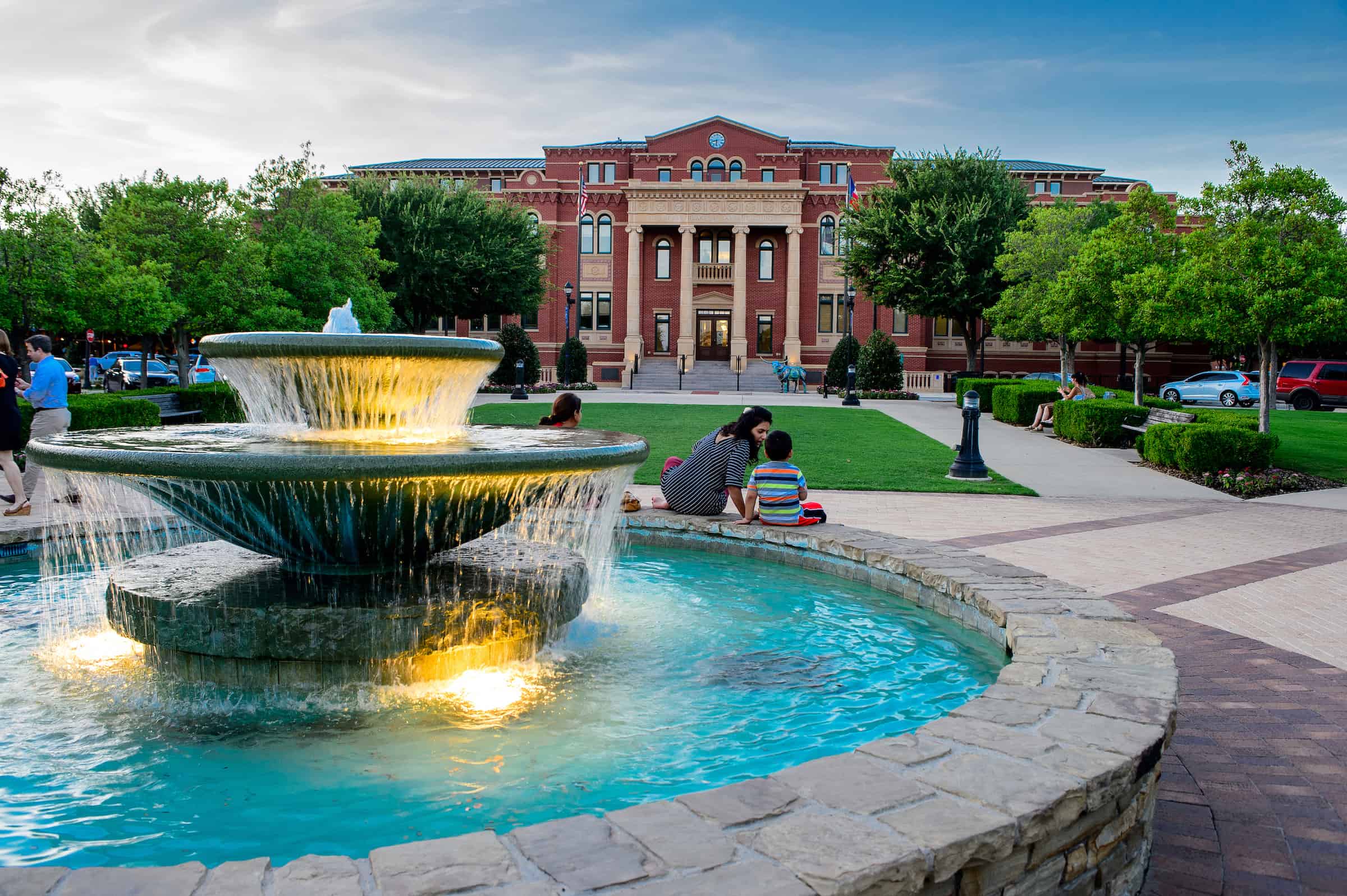 Cityscape of Southlake, TX, featuring well-maintained green spaces and vibrant community areas.